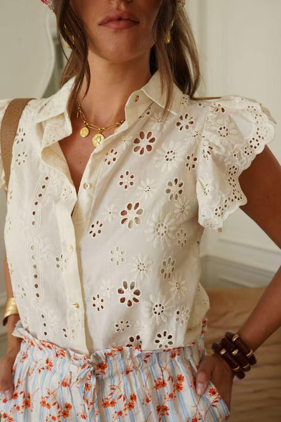 Ivory ruffle blouse