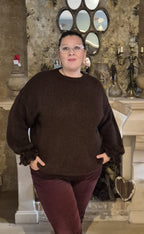 Wollen trui met strikdetail om de mouw