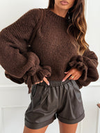 Wollen trui met strikdetail om de mouw