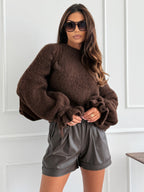 Wollen trui met strikdetail om de mouw